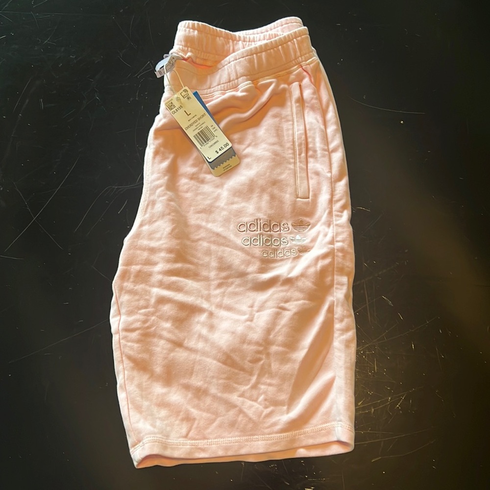 Large Adidas cotton shorts. Retails for $45 with tags.